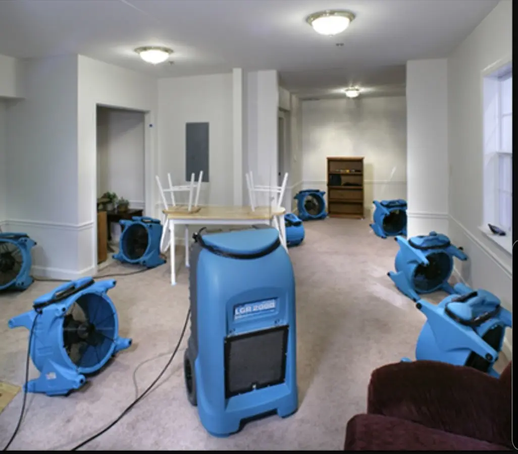 Air movers and dehumidifier setup for Water Damage Restoration in Rolesville